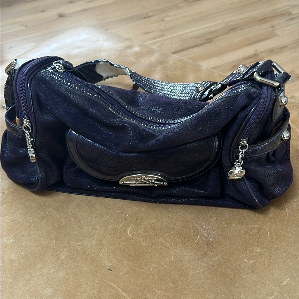 Purple leather handbag